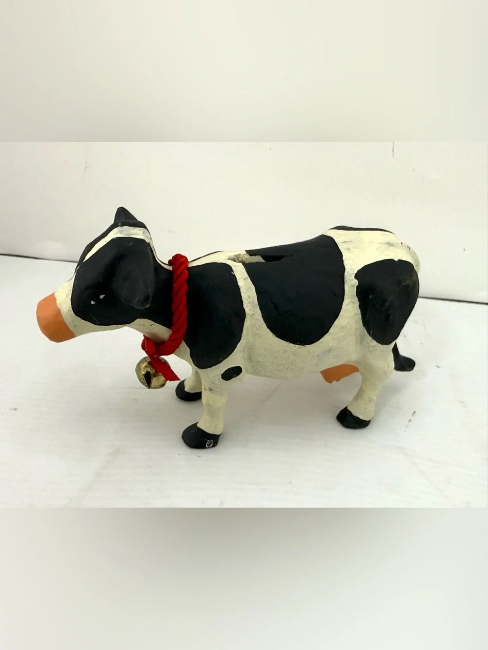 Vintage cast iron Holstein cow coin bank